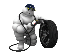 Michelin Man Checking Tire
